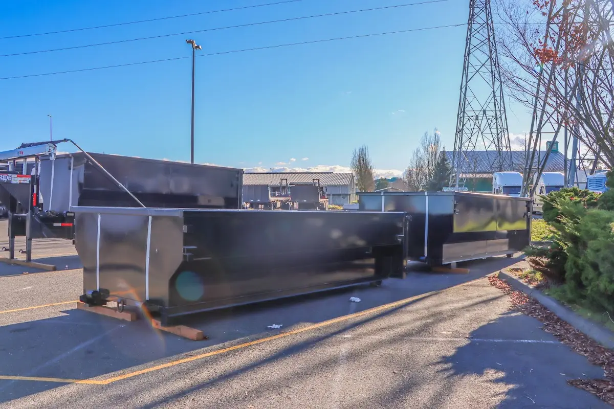 Roll-off dumpster ready for waste disposal at job site for Concrete Dumpster Rental in Montrose